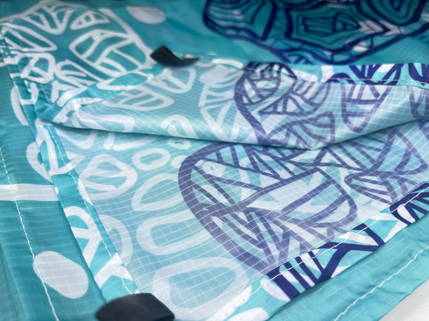 Lona de playa + estacas 130x210cm